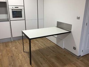 Vengiò space saving folding table